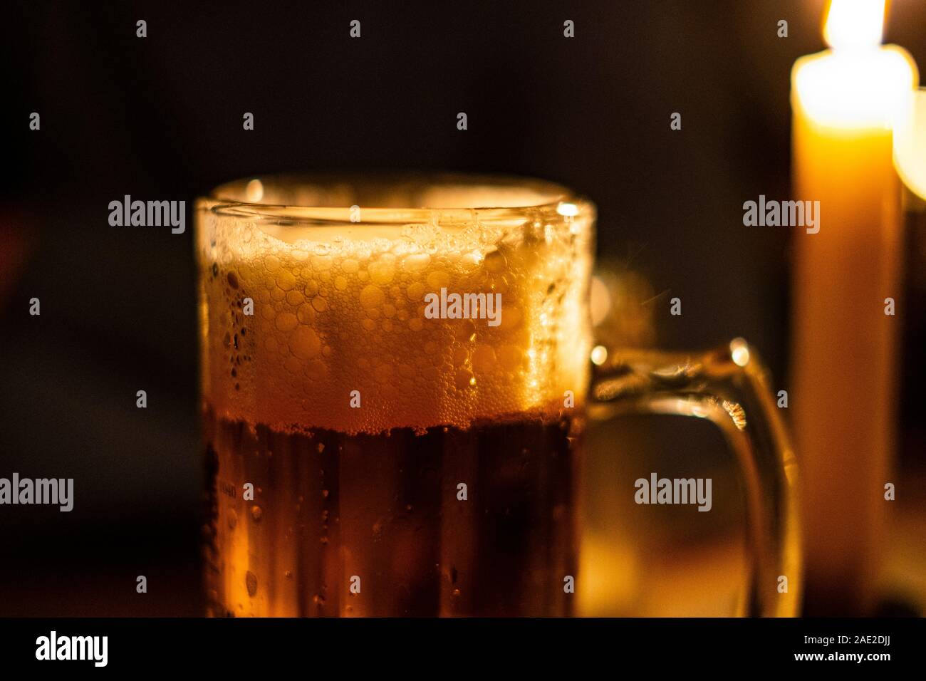 Pint of dark beer in the pub lightening Stock Photo