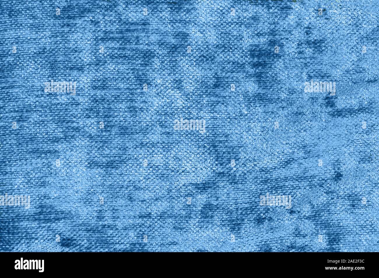Upholstery blue fabric texture. Trendy color of the year 2020. Abstract material pattern for furniture. Grunge virid textile background. Stock Photo