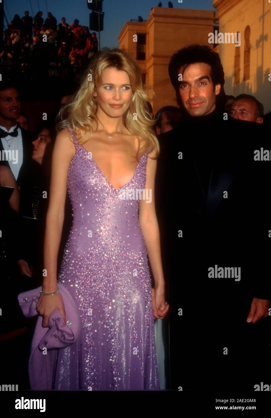 Los Angeles, California, USA 27th March 1995 Model Claudia Schiffer and magician David Copperfield attend the 67th Annual Academy Awards on March 27, 1995 at the Shrine Auditorium in Los Angeles, California, USA. Photo by Barry King/Alamy Stock Photo Stock Photo