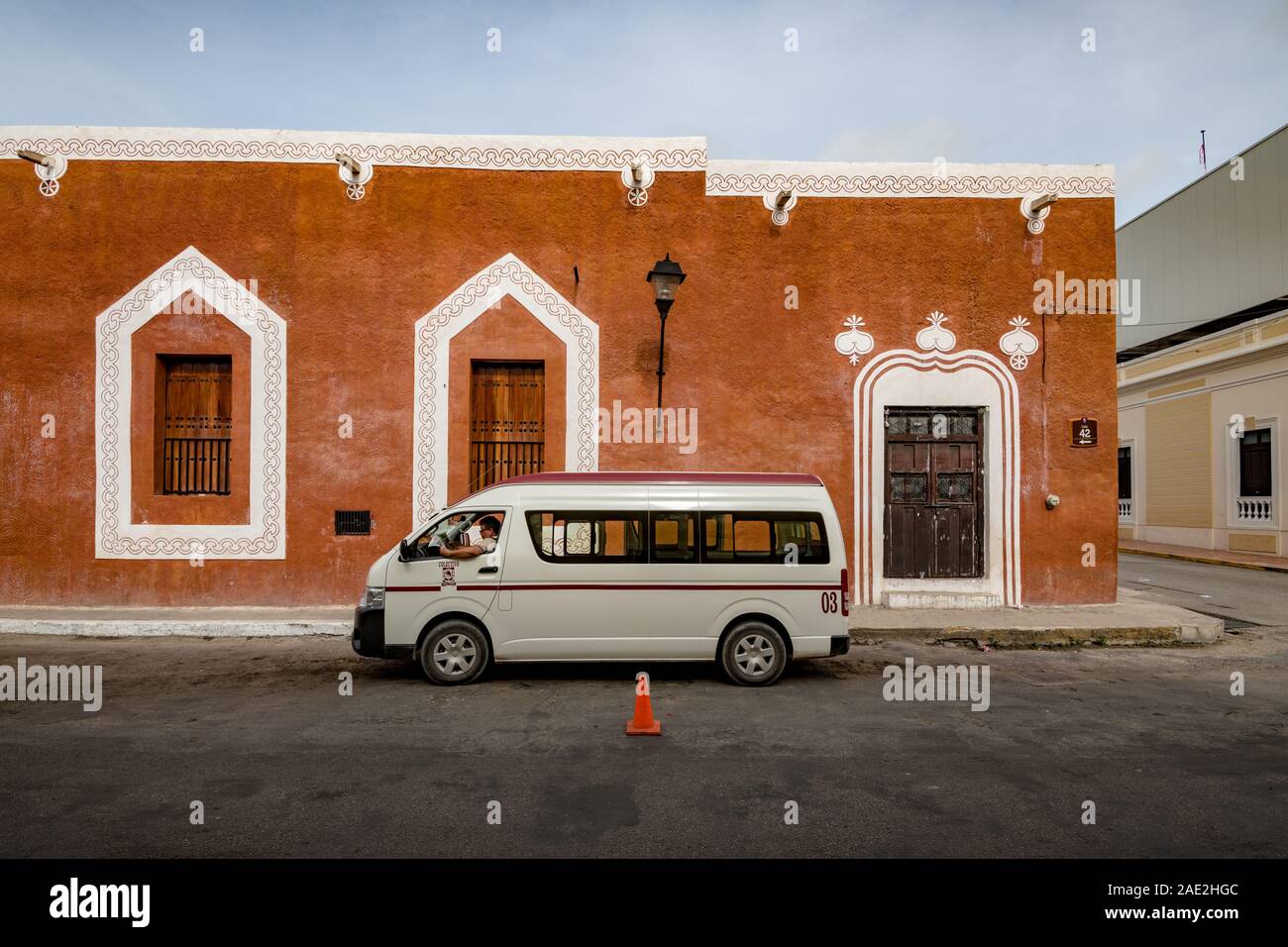 A toursit mini bus / taxi on a Colonial street Valladolid, Yucatan, Mexico Stock Photo