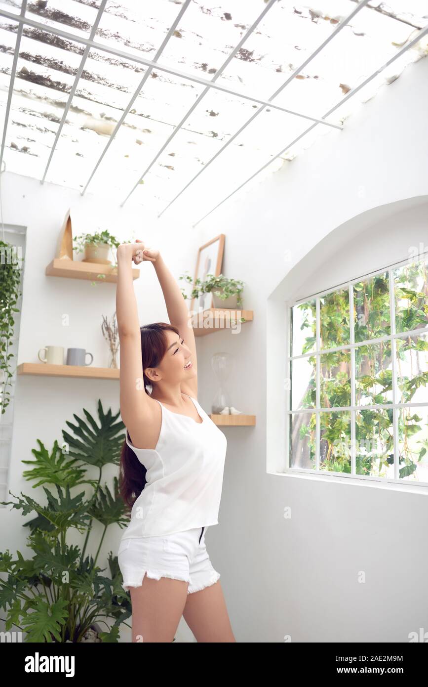 Women stretching arms hi-res stock photography and images - Alamy