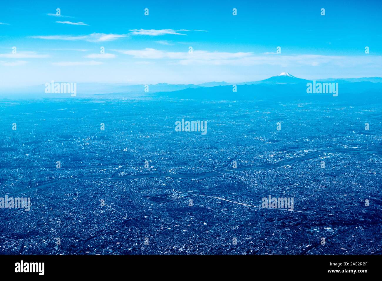 Aerial view of the Kanto plain with Mount Fuji,  Tokyo metropolitan area and Kawaguchi (Saitama Prefecture) on the far right Stock Photo