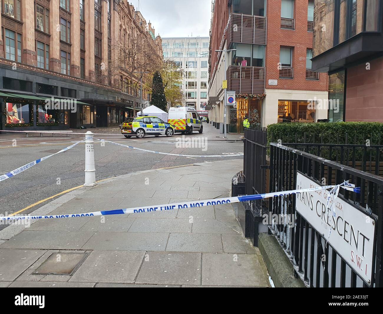 The scene in Knightsbridge, where a murder investigation has begun after a man was knifed to death near Harrods department store in a suspected robbery, as he made his way home from a nearby restaurant. Stock Photo