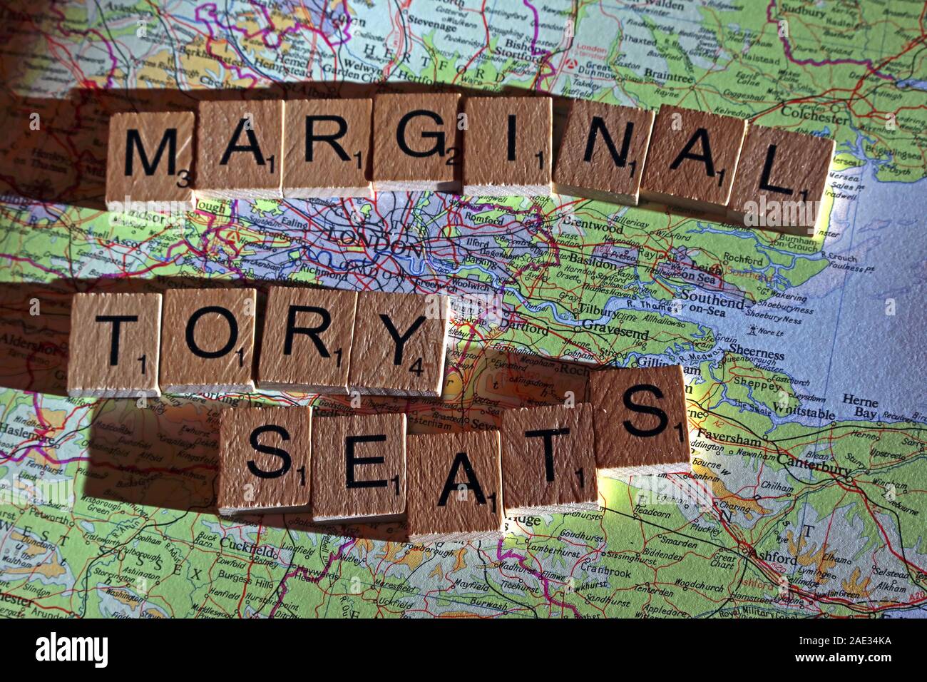 Marginal Tory Seats spelt in Scrabble letters on a UK map - General Election, elections, party political,leaders,parties,claims,doubts Stock Photo