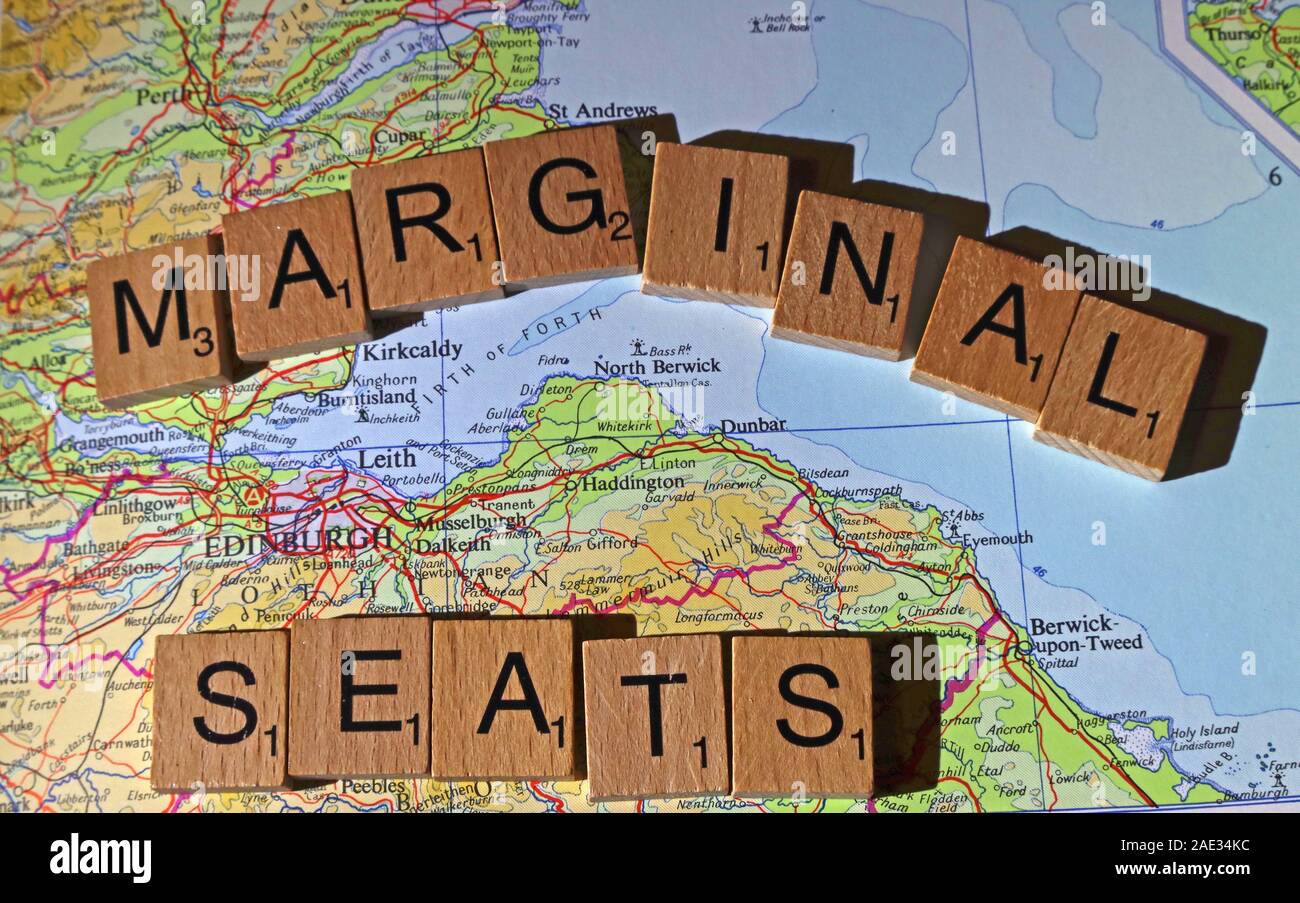 Marginal Seats spelt in Scrabble letters on a UK map - General Election, elections, party political,leaders,parties,claims,doubts Stock Photo