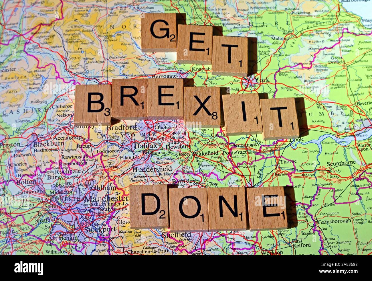Get Brexit Done spelt in Scrabble letters on a North of England UK map - General Election, elections, party political,leaders,parties,claims,doubts Stock Photo