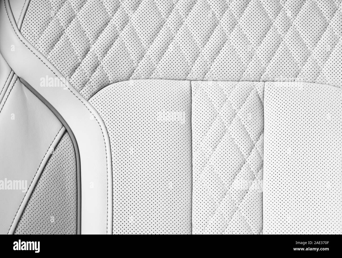 Modern luxury Car white leather interior. Part of perforated leather