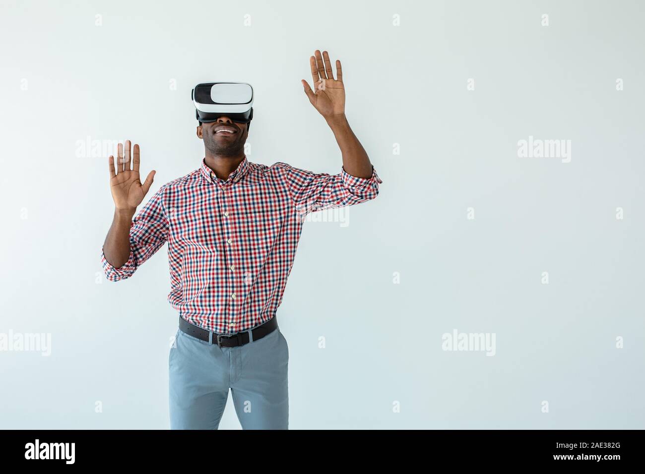 Cheerful handsome afro american man testing vr glasses Stock Photo