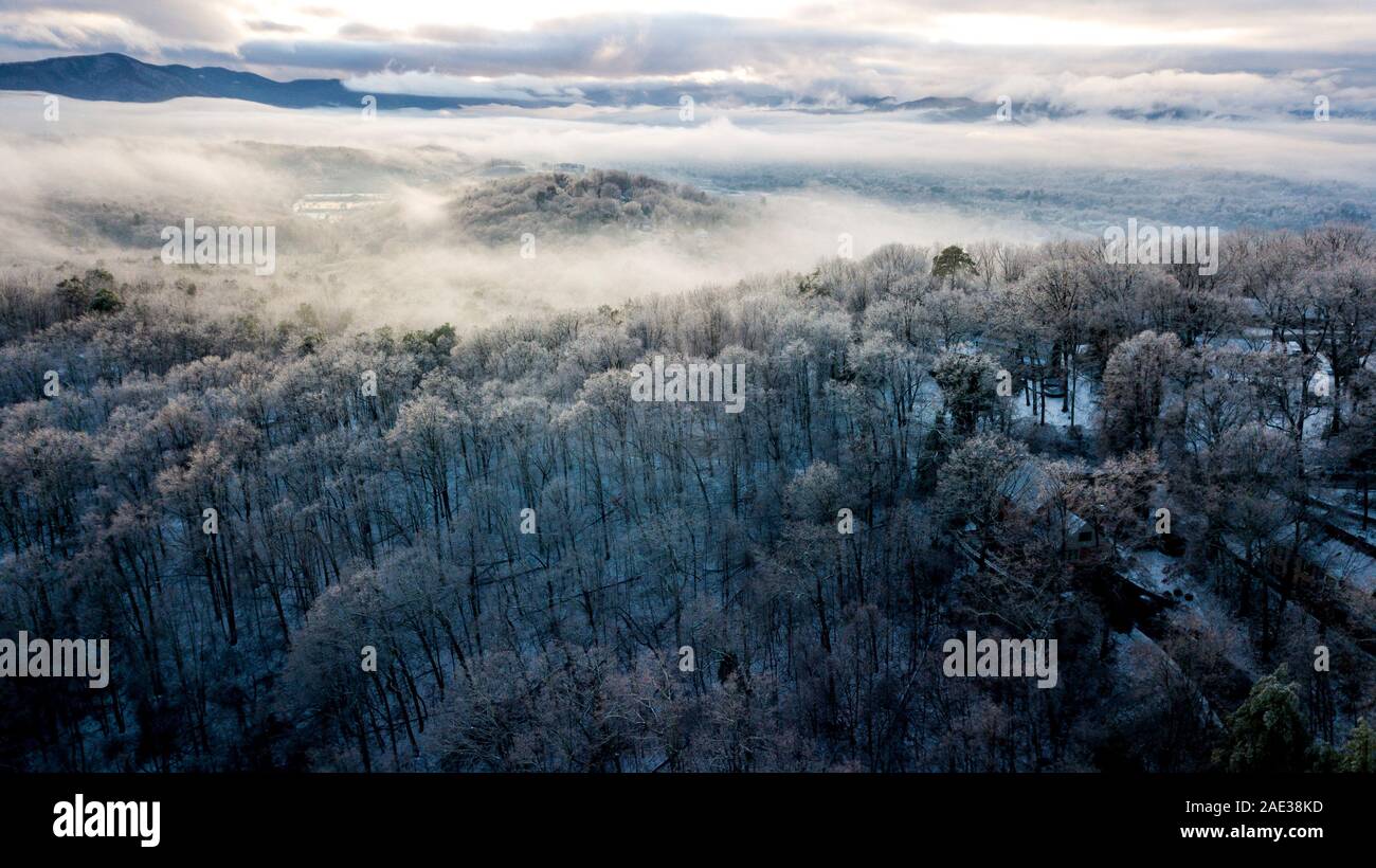 Misty Mountain Forest Ariel shot in the winter Stock Photo