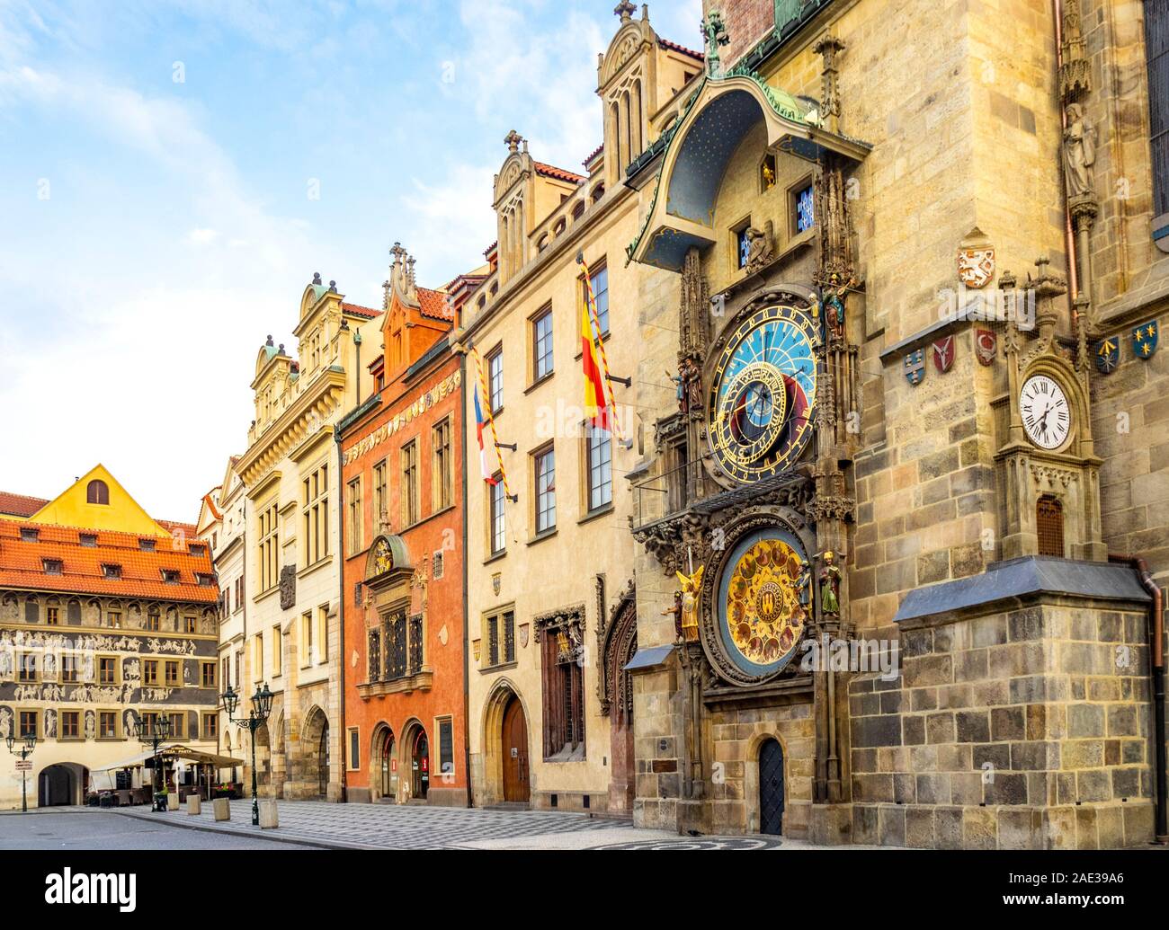Historic Dum u Minuty with ornate decorative sgraffito and medieval astronomical clock in the Old Town Hall Prague Czech Republic. Stock Photo