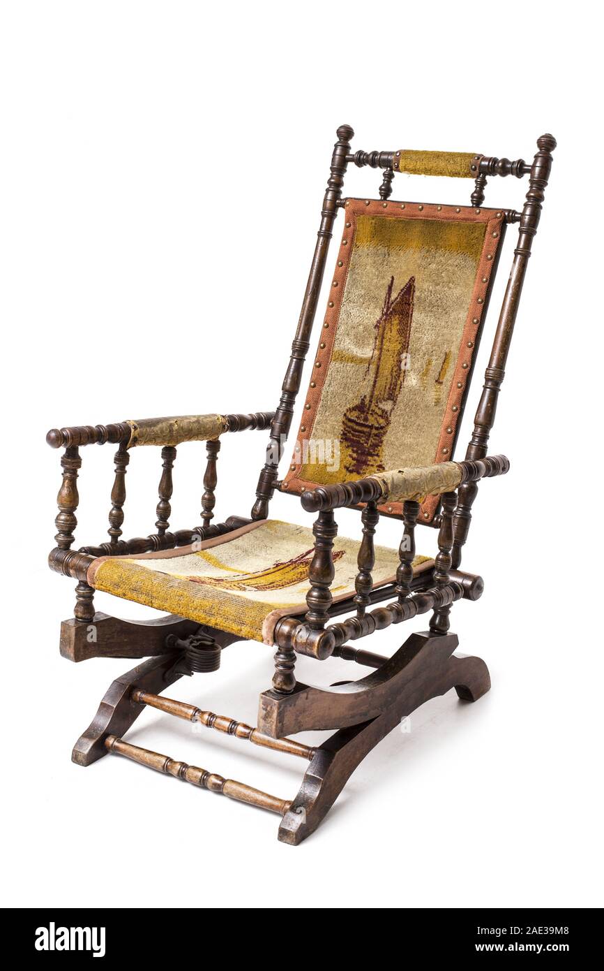 Antique rocking chair with the spring mechanism of the swing. Late 19th century. Stock Photo