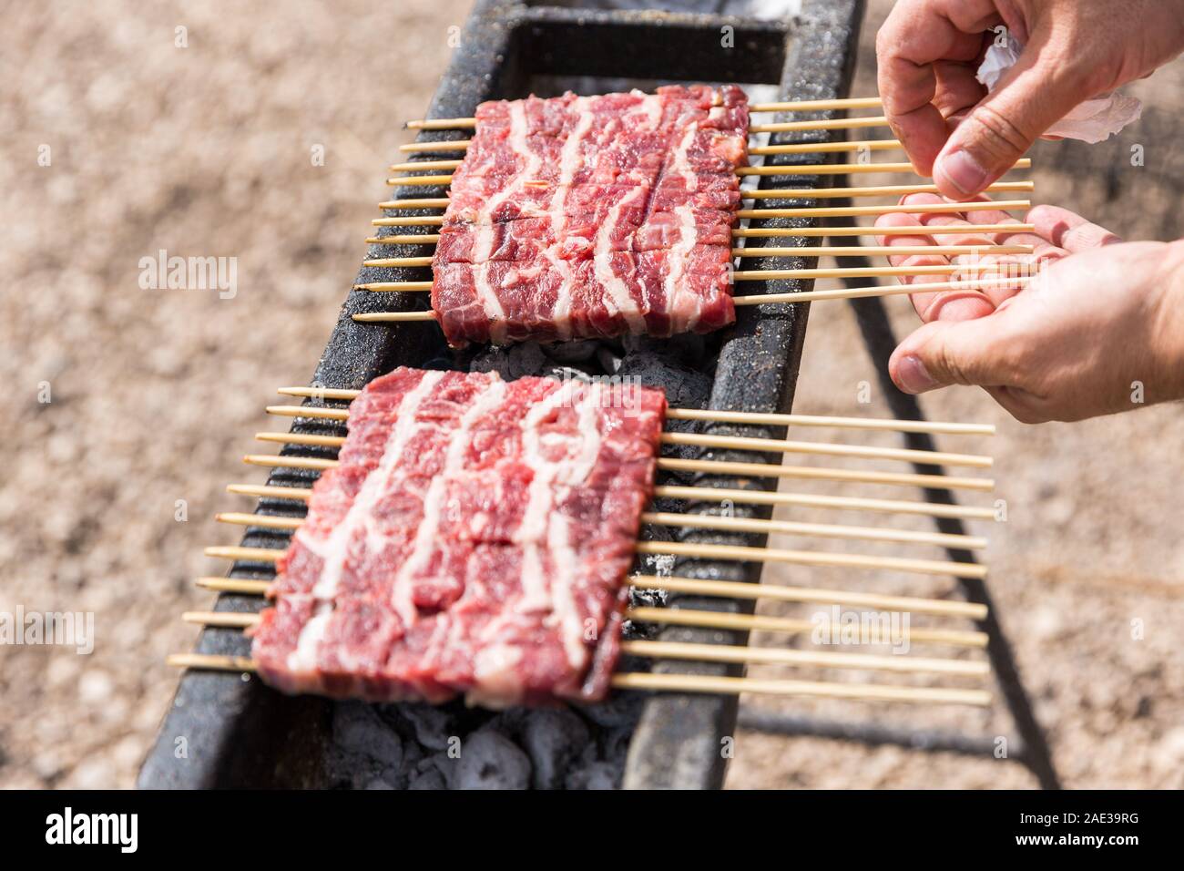The arrosticini, a typical food from the Abruzzo region (Italy). Small  skewers of sheep meat in this case ready to be cooked on the grill Stock  Photo - Alamy