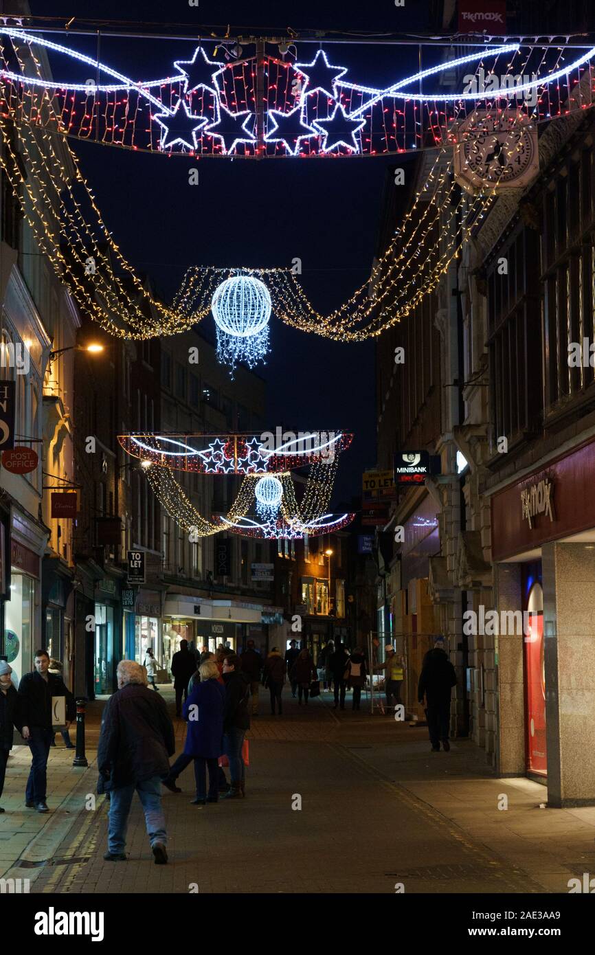 Christmas Lights along a pedestrian shopping precinct, Coney Street, York, North Yorkshire