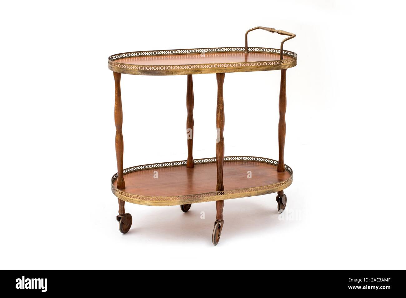 Antique serving trolley on wheels, decorated with galleries Stock Photo