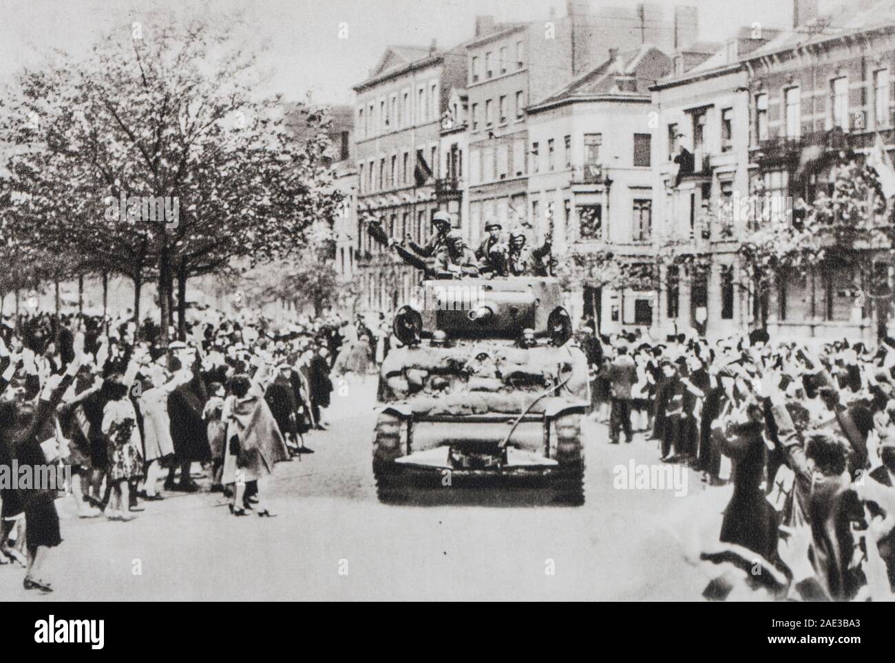 The Americans are entering Liege. The joy is great, in spite of the immense damages caused by the flying bombs. Stock Photo