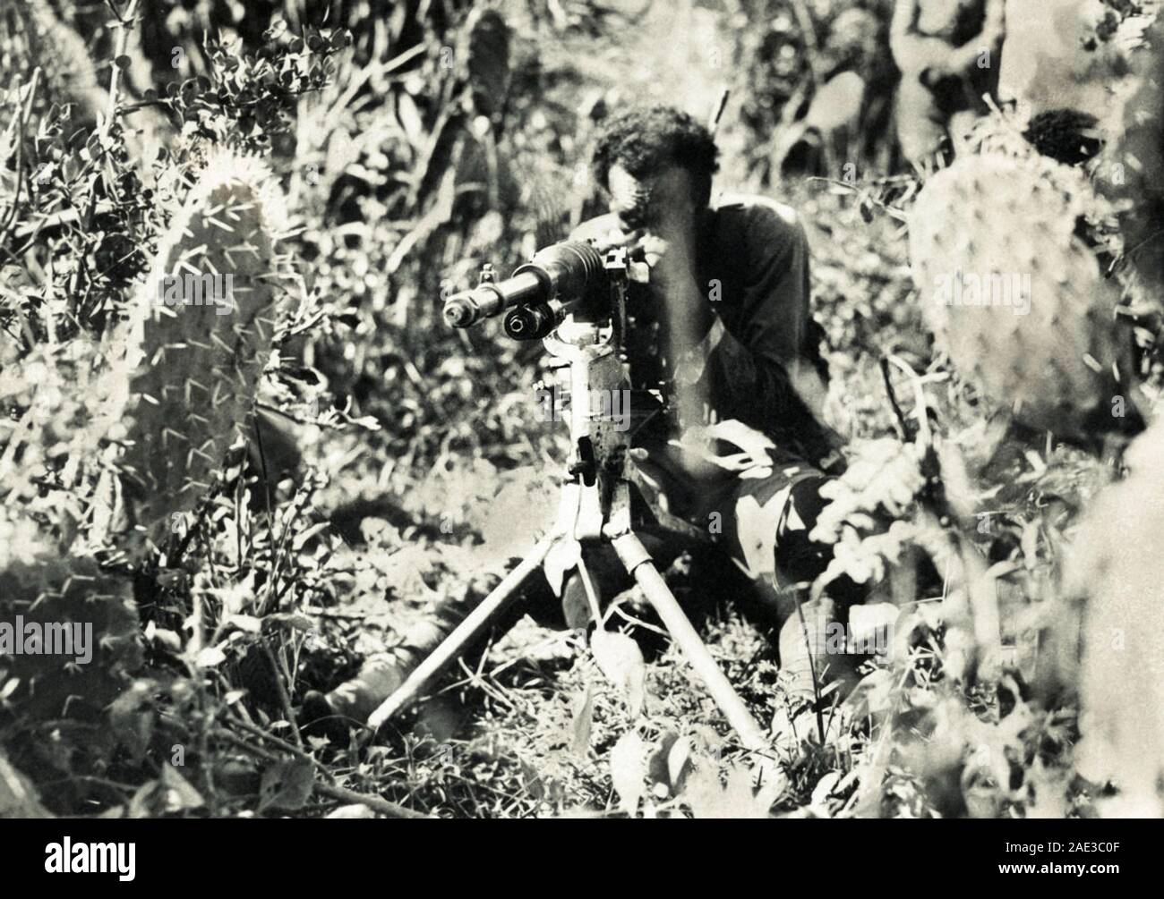 Ethiopian machine gunner in battles with Italians during Second Italo-Ethiopian War. 1935-1936 Stock Photo