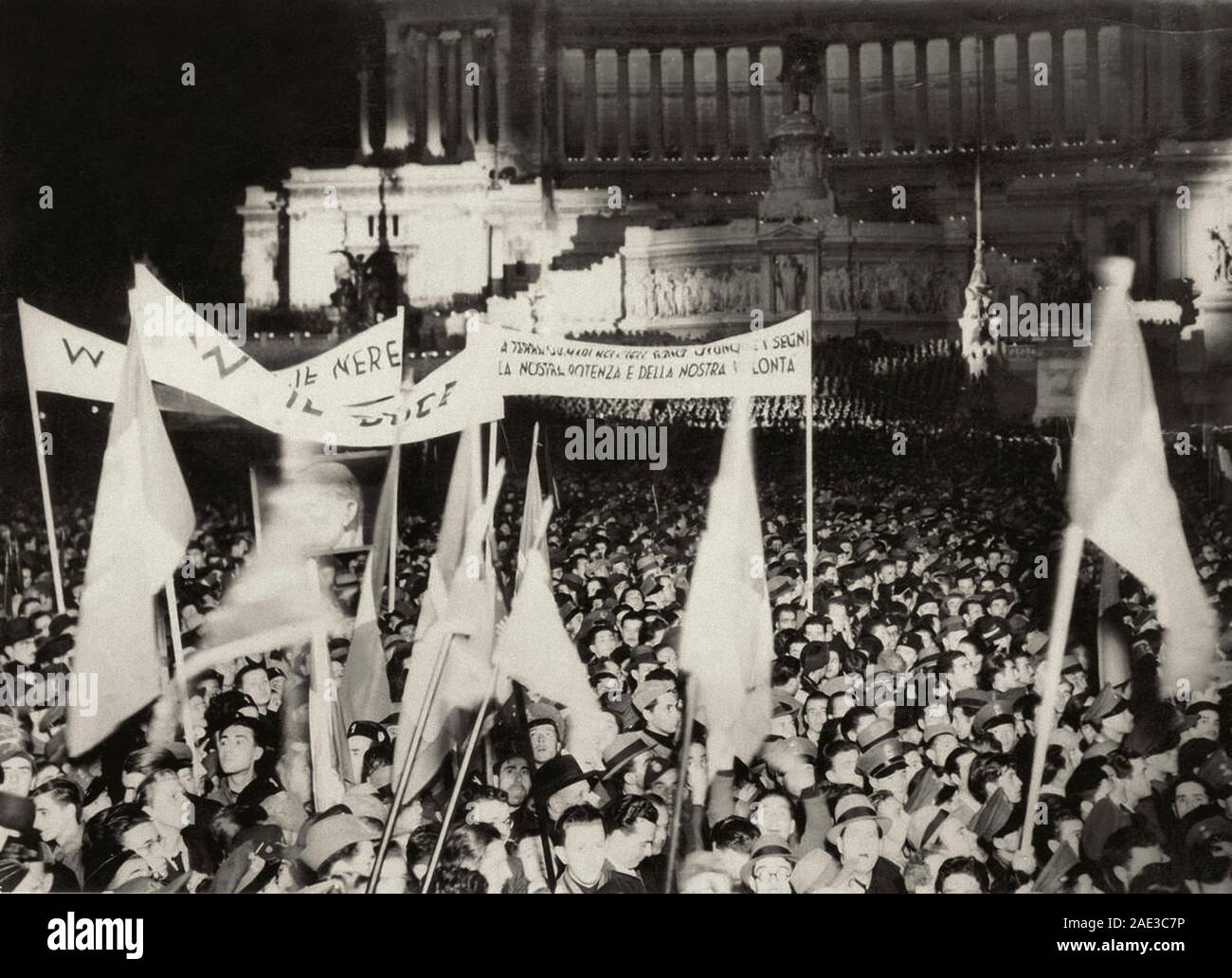 A crowd in Venice square in Rome celebrates the fall of Addis Ababa and the annexation of Abyssinia. One thousand nine hundred thirty six Stock Photo
