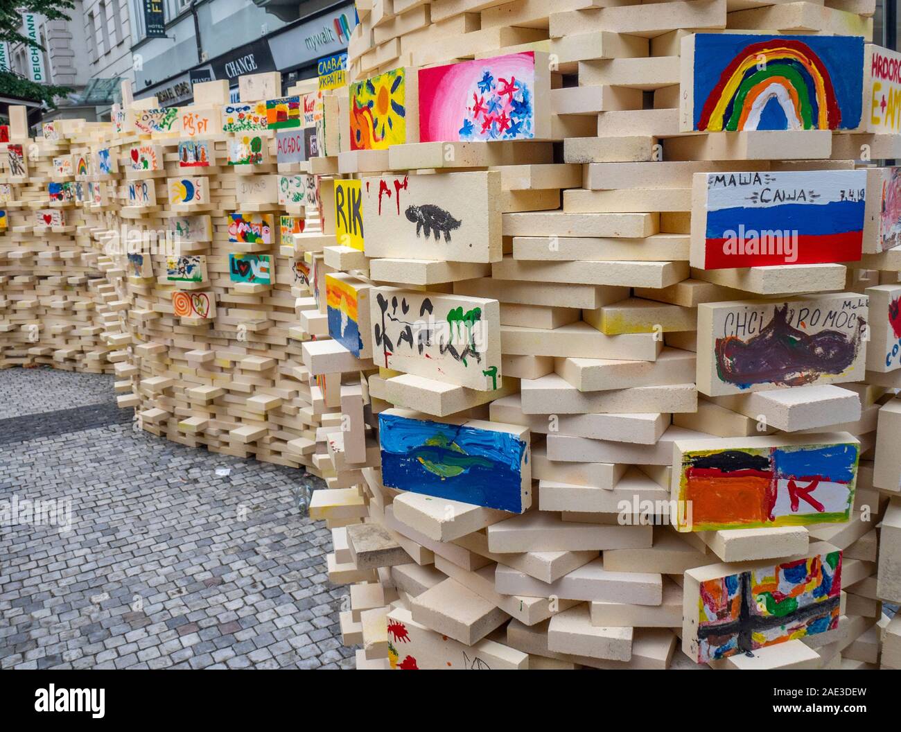 The Beneficial Brick Initiative fundraising by paying to paint bricks  Prague Czech Republic Stock Photo - Alamy