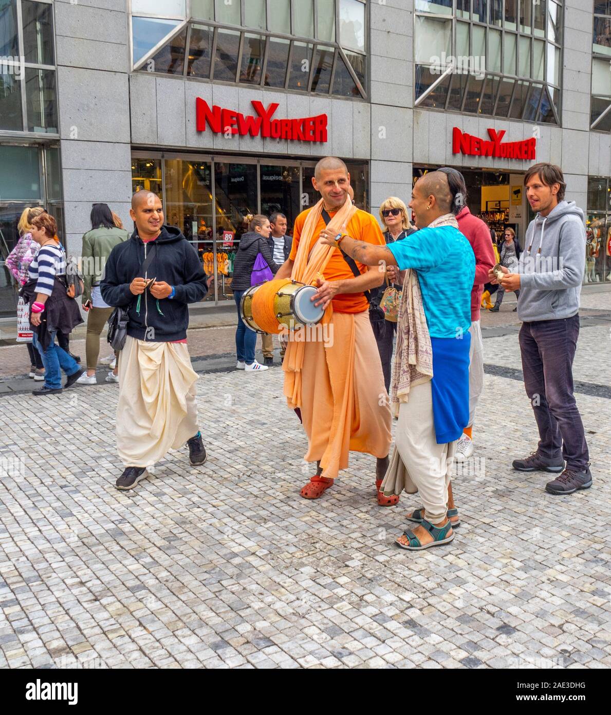 Hare Krishna members chanting singing and parading in Prague Czech Republic. Stock Photo
