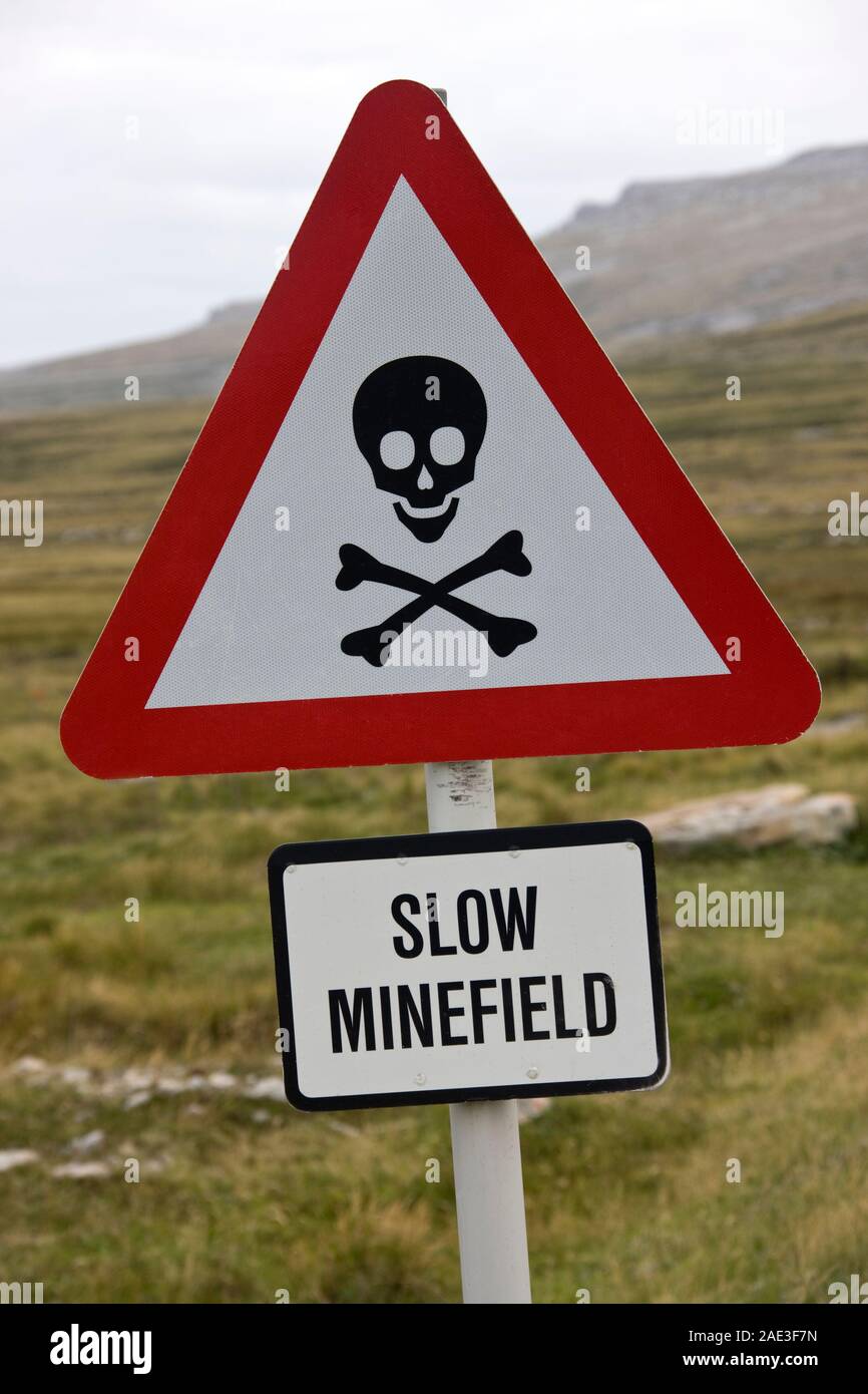 Minefield Sign near Stanley, the capital of the Falkland Islands (Islas Malvinas).  Large areas of land remain unsafe following the Falkland War, a 10 Stock Photo