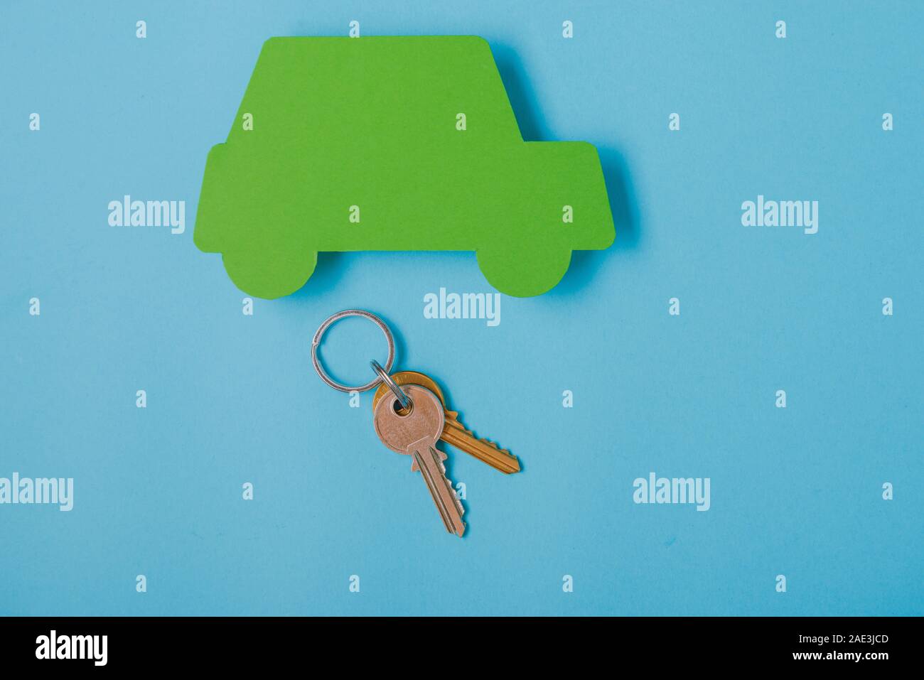 Paper Car Key paper green cars figure with keys. top view on blue background Stock ...