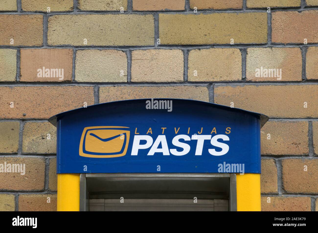 Riga, Latvia - November 30, 2019 : Latvijas pasts or in English Latvian  Post mail box on brick wall background, the main state-owned postal service  pr Stock Photo - Alamy