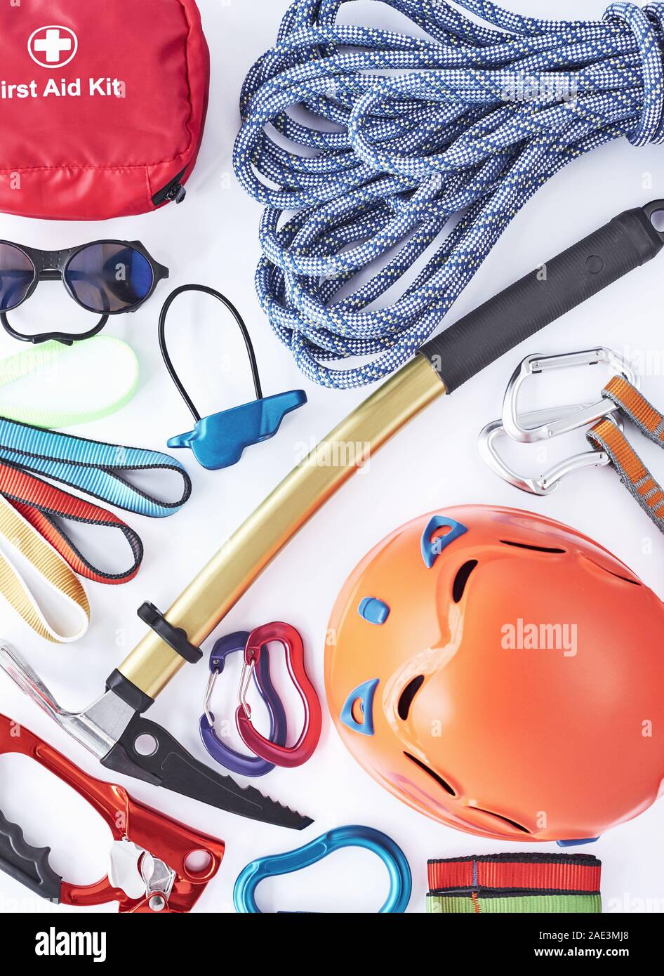 Beautiful new materials. Top view. Climbing equipment for the safeness lying on the white table. Conception of extreme sports Stock Photo