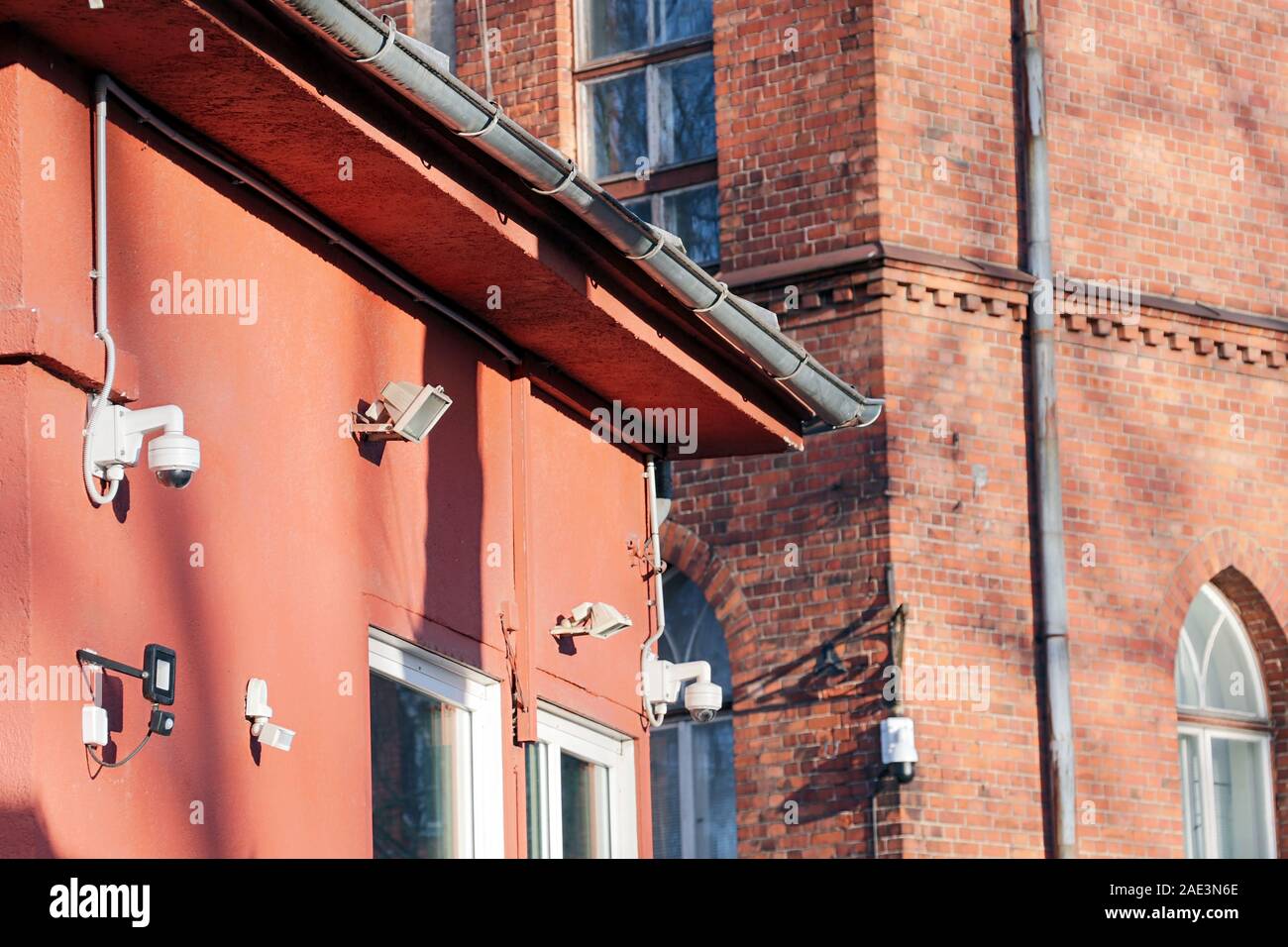 Surveillance cameras on the corner of building, Surveillance of the public  using CCTV is common in many areas around the world Stock Photo - Alamy