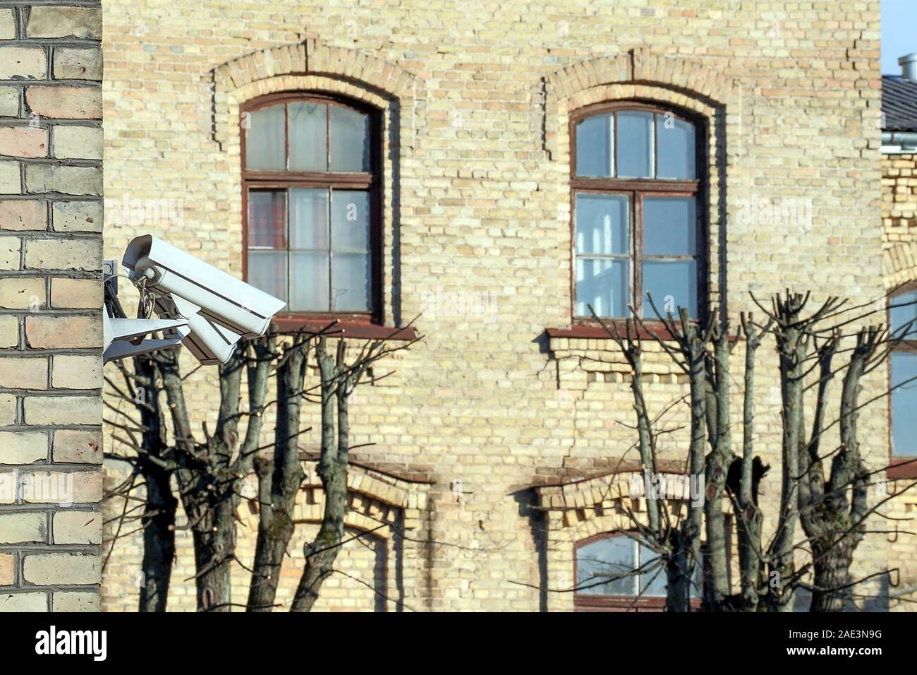 Surveillance cameras on the corner of building, Surveillance of the public  using CCTV is common in many areas around the world Stock Photo - Alamy