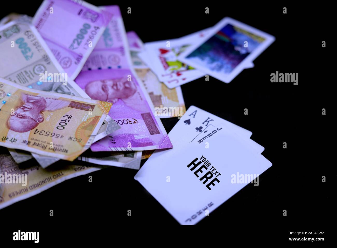 Playing Poker Playing Cards With Indian Rupee Banknotes On Black Backgrounds Stock Photo Alamy