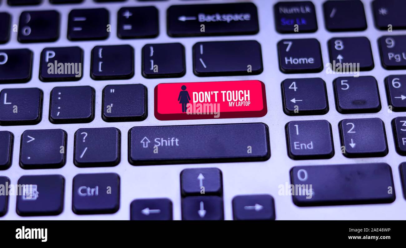 Red Key Alert Message With Don T Touch My Laptop Icon On Laptop Keyboards Stock Photo Alamy