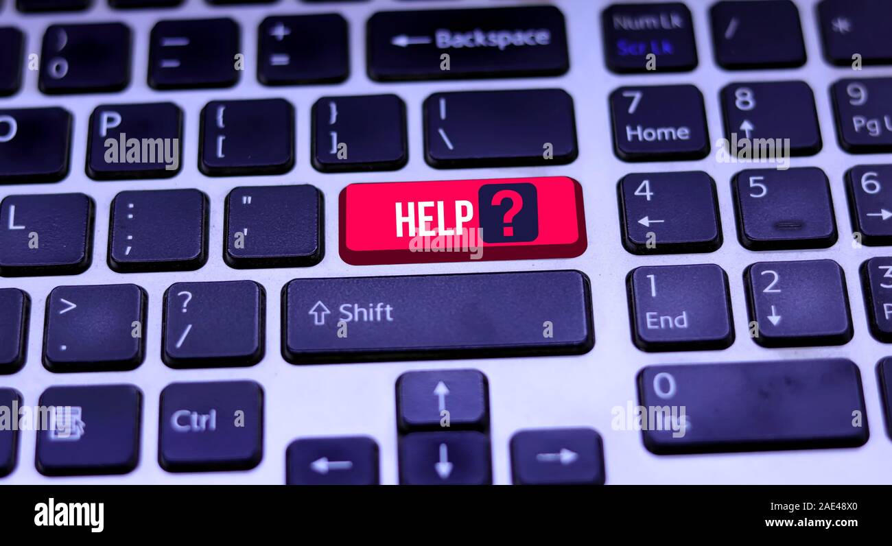 Laptop keyboard and red help key. Help keyboard button on the keyboards  Stock Photo - Alamy
