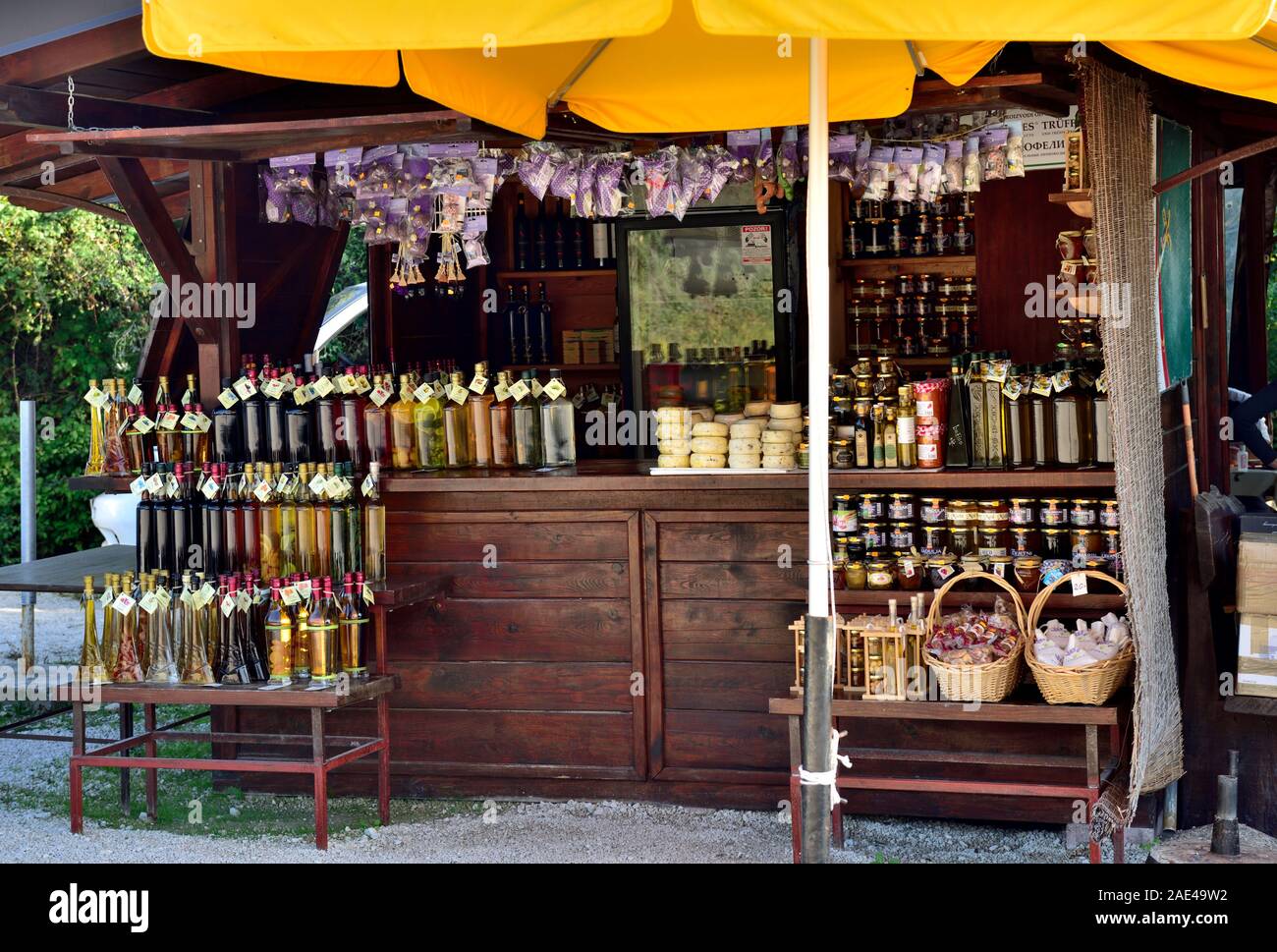 Roadside farm produce stall selling olive oil, cheese and produce, stall Panorama Limski Fjord, on D75 road, Istria, Croatia, Stock Photo