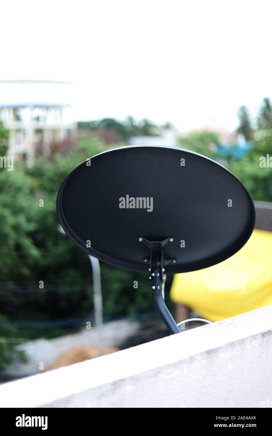 Installed Satellite dish or DTH or Direct to home tv on the roofs Stock Photo Alamy