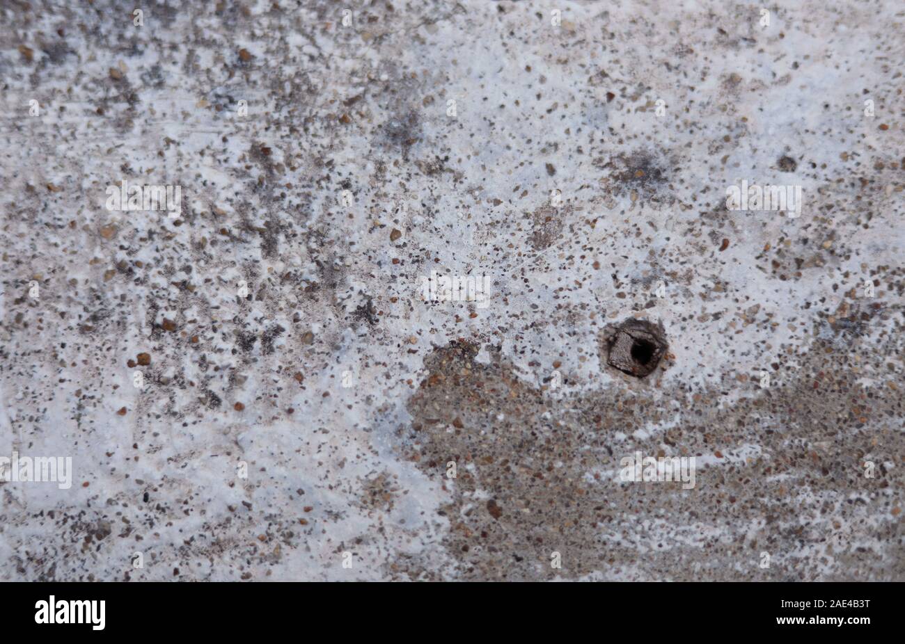 Hole in the destruction concrete wall, abstract background free space ...