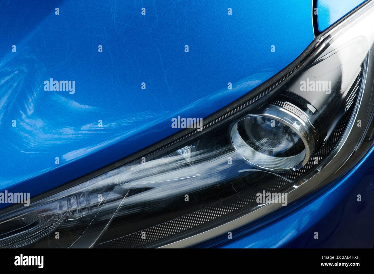 Dents on car paint from pets claws. Damage vehicle body Stock Photo