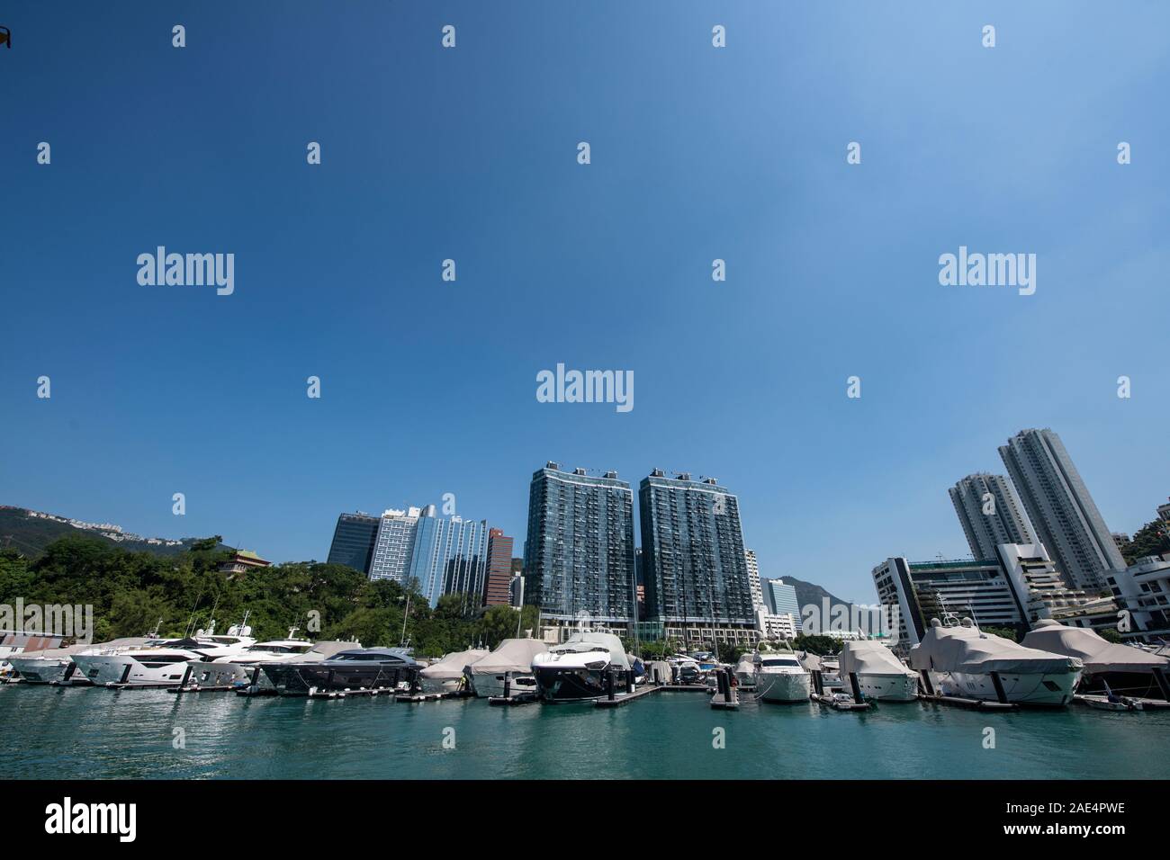 Luxury yachts moored in Hong Kong Island's Aberdeen Harbour Stock Photo