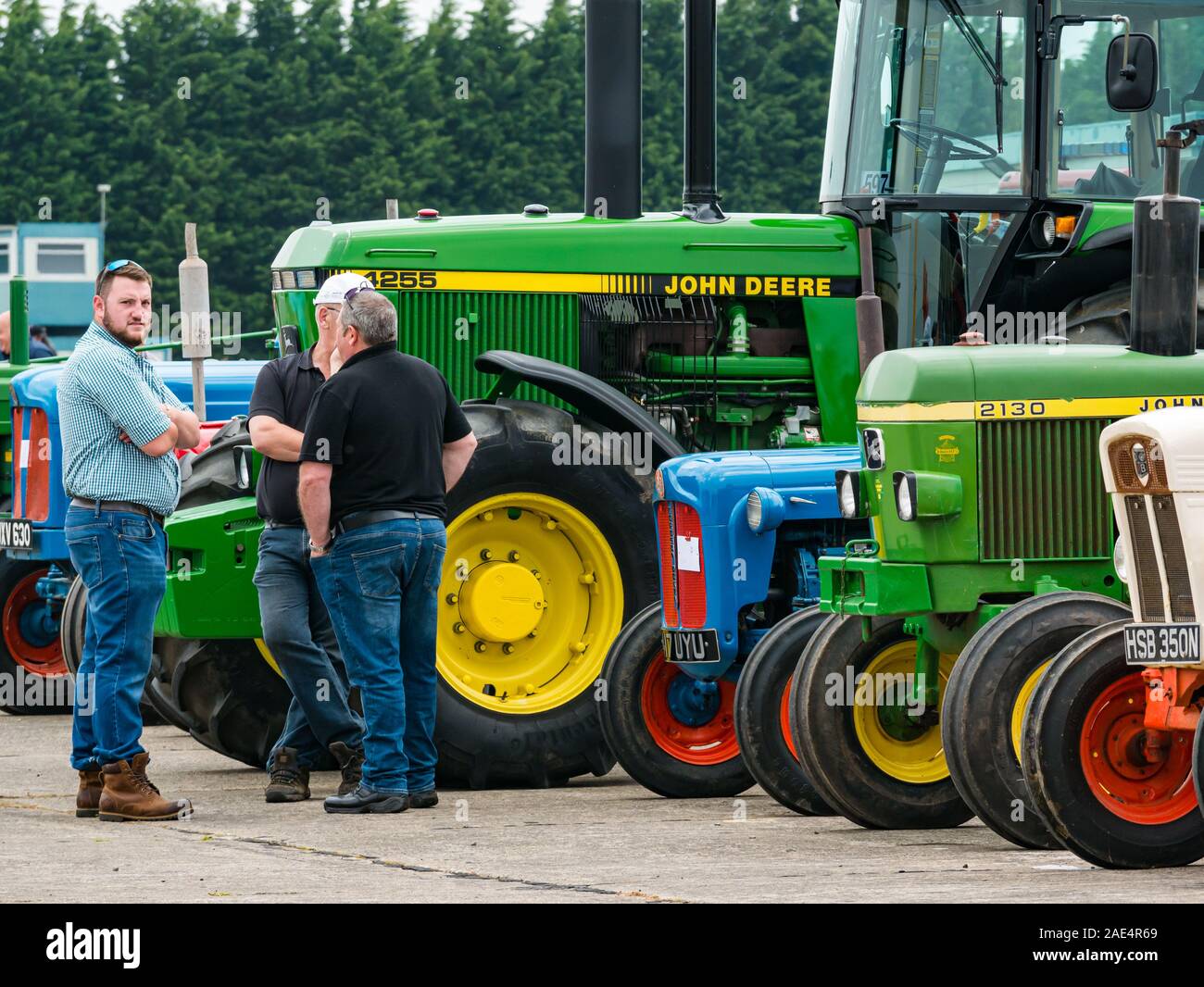 Group of men with vintage tractors, Haddington Agricultural Show, East Lothian, Scotland, UK Stock Photo