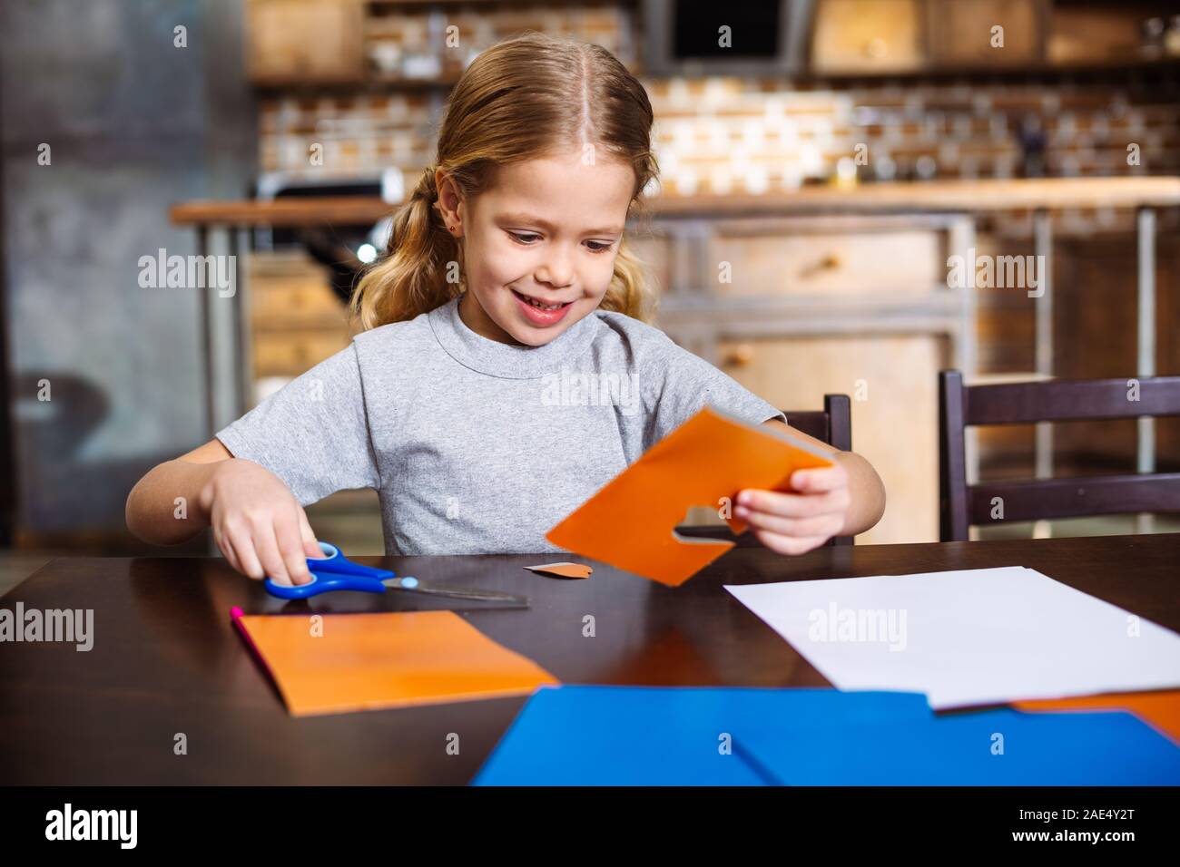 Cheerful Little Girl Making A Birthday Card Stock Photo Alamy
