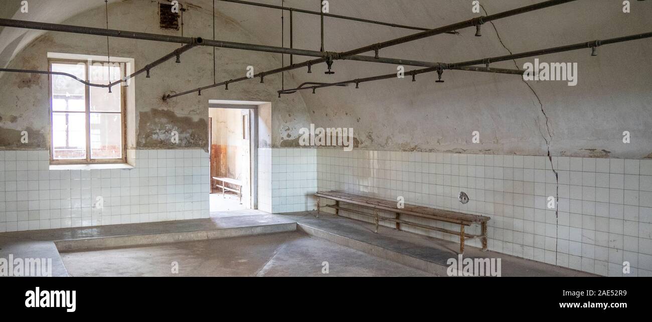 Showers in shower room in Theresienstadt Malá pevnost small fortress Nazi concentration camp Terezin Czech Republic. Stock Photo