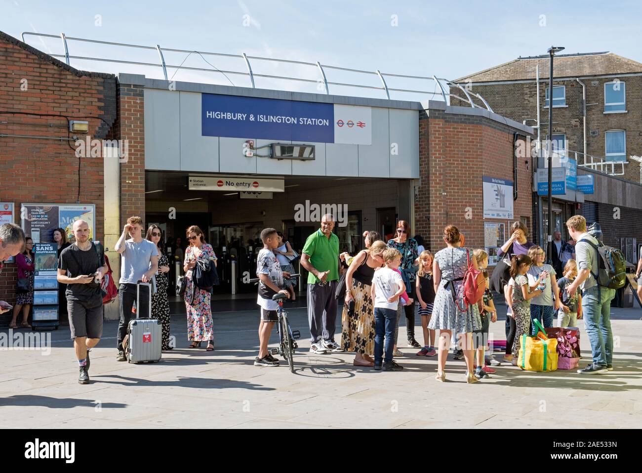 People, passengers waiting outside Highbury and Islington Station