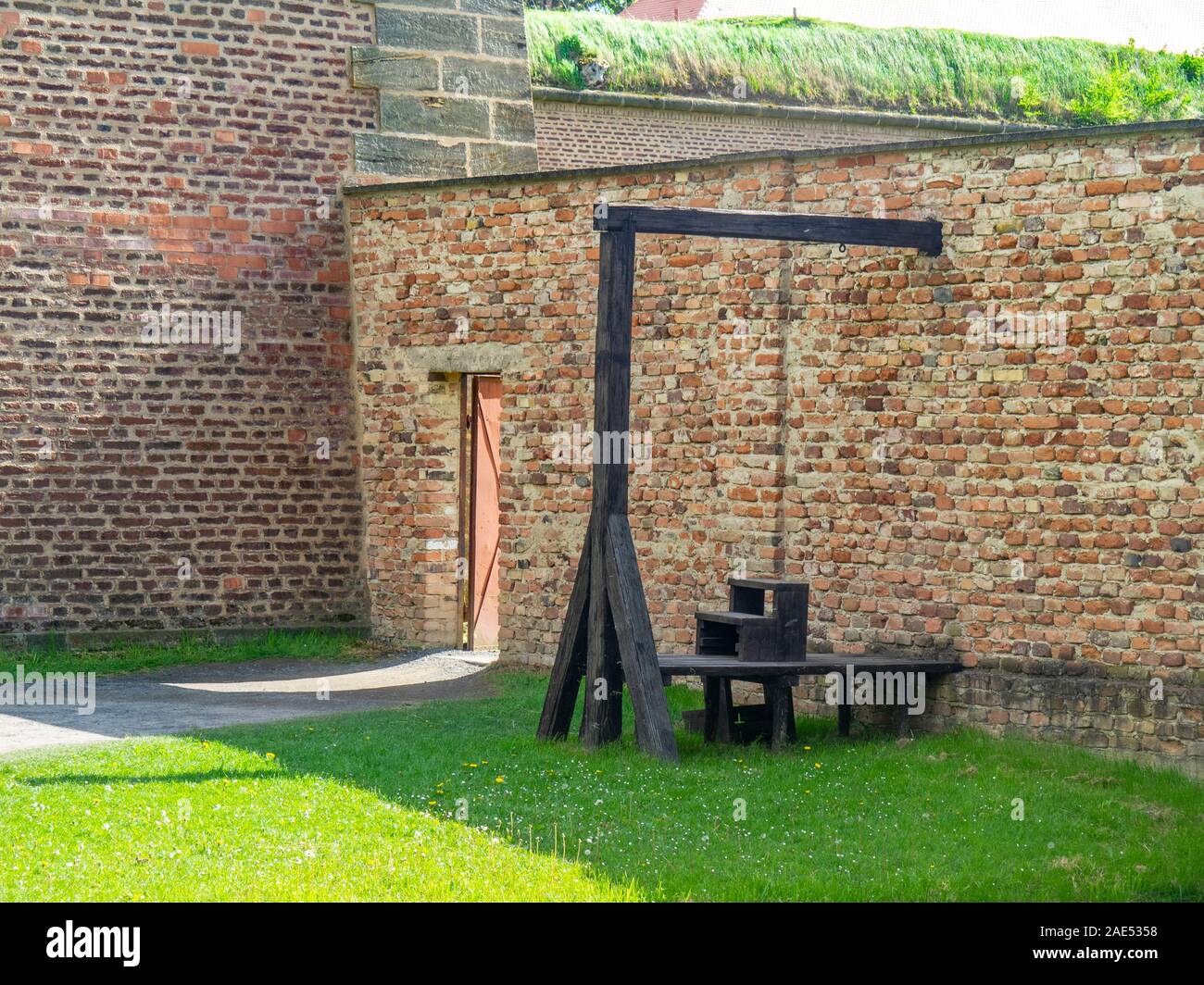 Wooden gallows scaffold for hanging executions in Theresienstadt Malá pevnost small fortress Nazi concentration camp Terezin Czech Republic. Stock Photo