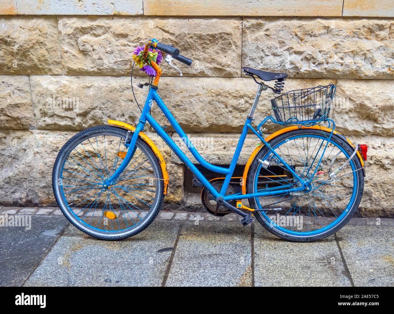 Blue and orange vintage bicycle Stock Photo