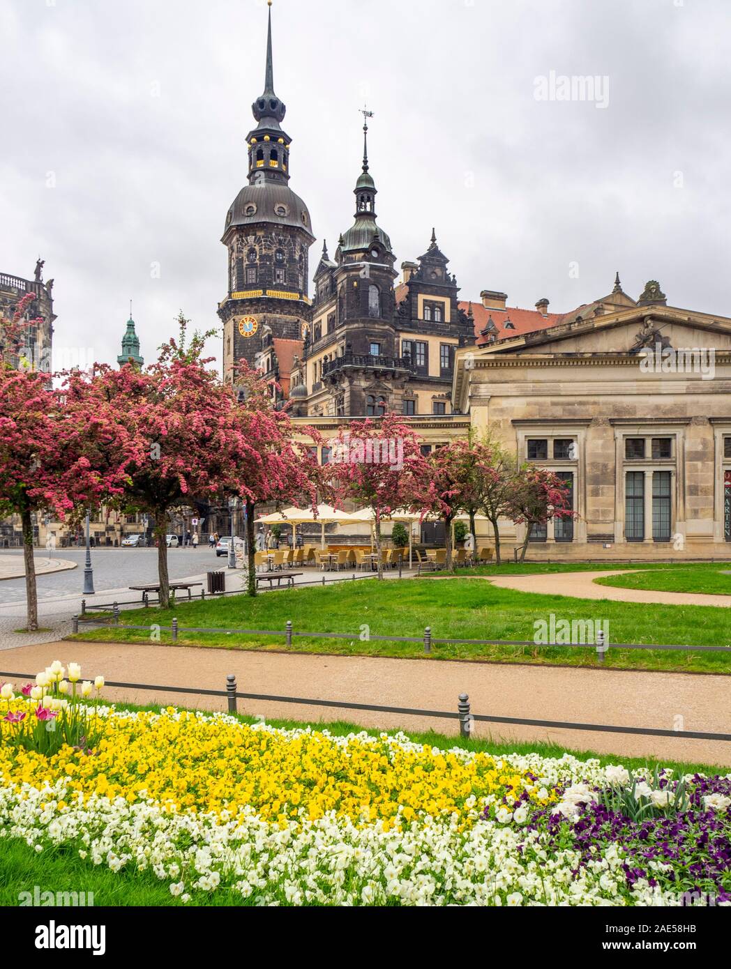 Garden in Theatreplatz Schinkelwache, and clock tower of Royal Palace Dresden Castle Altstadt Dresden Saxony Germany. Stock Photo