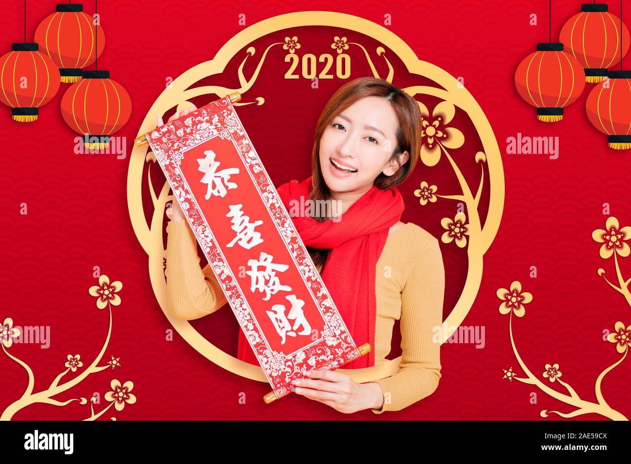 asian young woman celebrating for chinese new year. chinese text happy new year 2020 Stock Photo