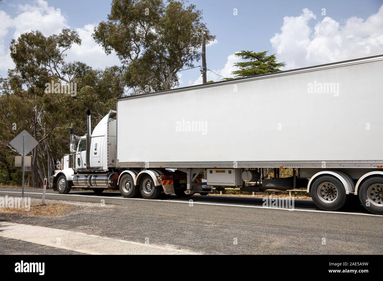 Australian heavy goods vehicle freight transport travelling in regional new south wales,Australia Stock Photo