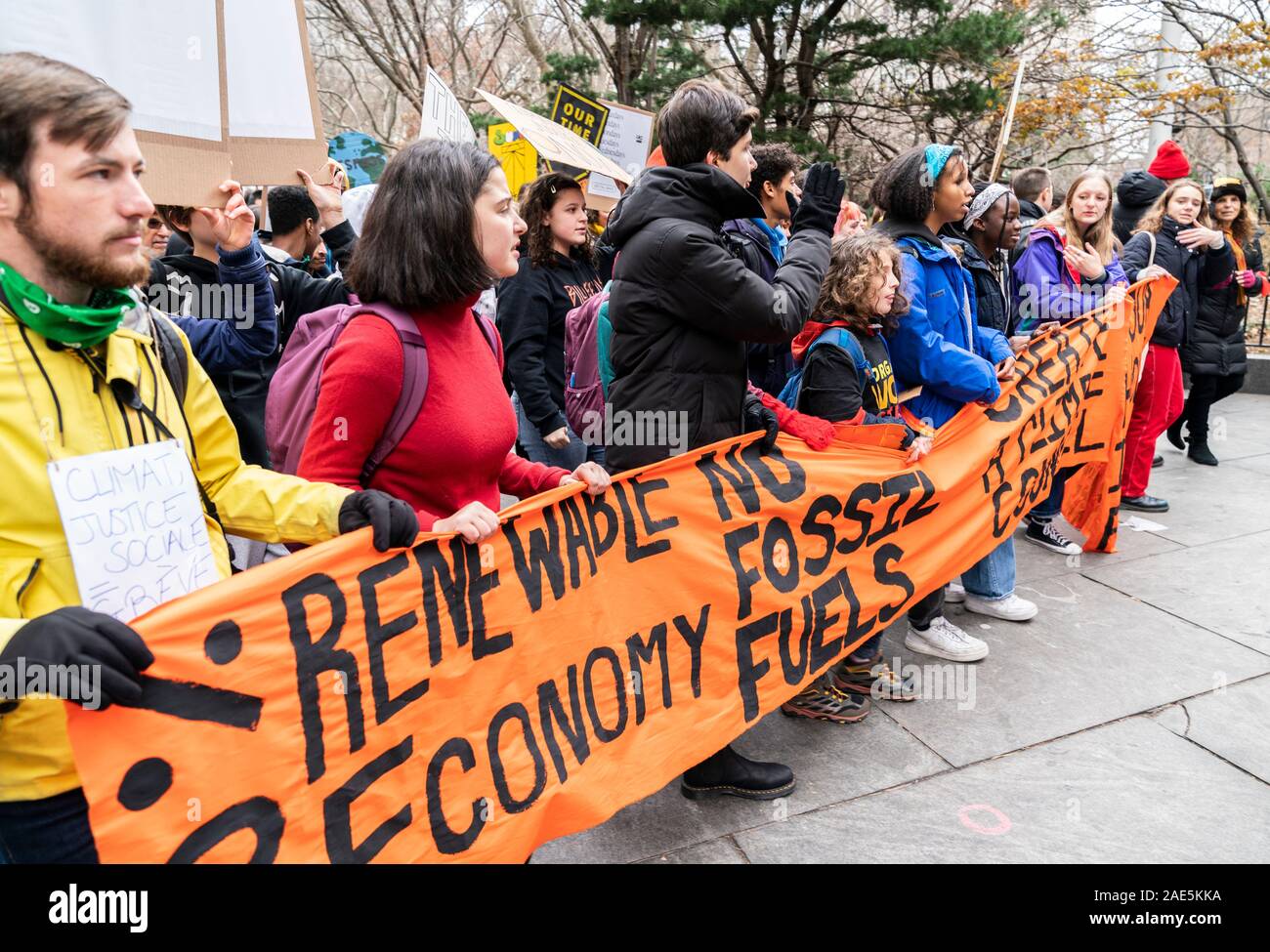 New York, NY - December 6, 2019: Few hundreds students and their supporters rally against climate change policies by march around City Hall Park Stock Photo