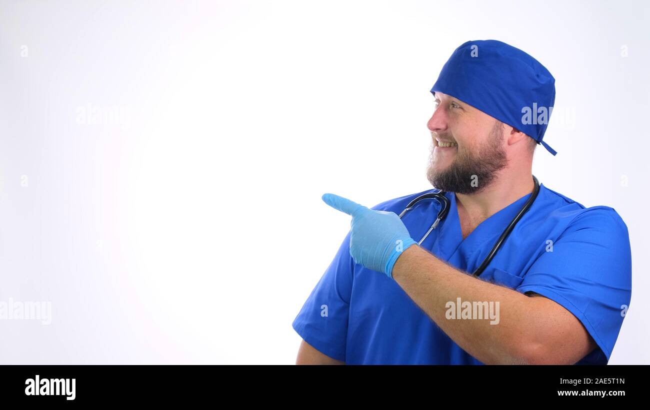 Bearded doctor in blue uniform hi-res stock photography and images - Alamy