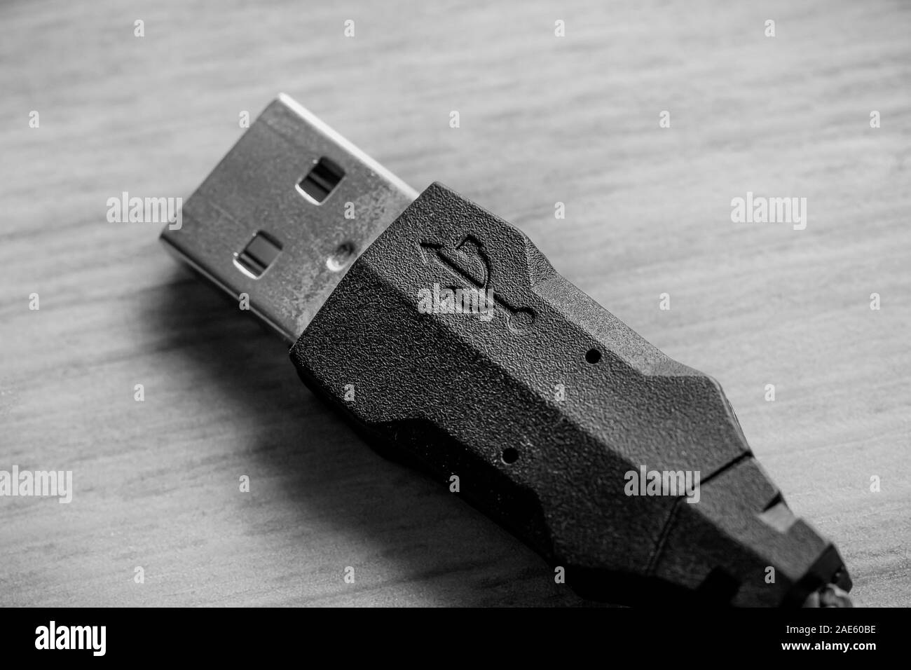 Photo of a usb cable on a table. Stock Photo