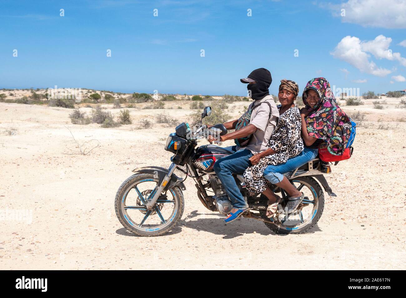 Indigenous Wayuu on a motorcycle in the Guajira peninsula of northern Colombia. Stock Photo